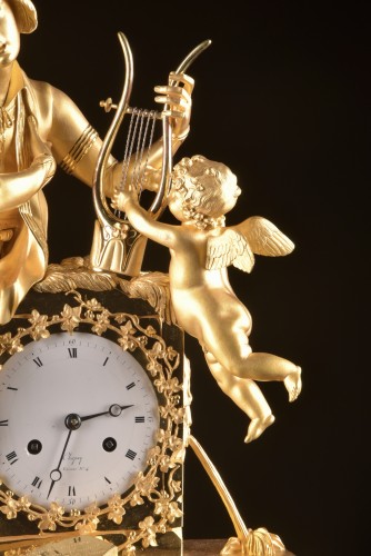 Troubadour et Amour, Chapuy - Pendule Empire en bronze doré - Mora Antiques