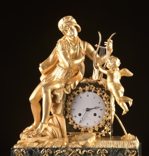 Antiquités - Troubadour et Amour, Chapuy - Pendule Empire en bronze doré
