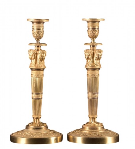 Paire de bougeoirs Empire en bronze ciselé et doré