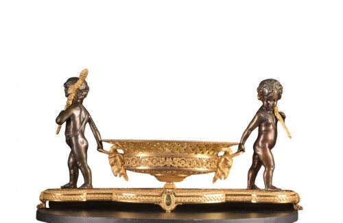 Charles X centerpiece in gilt bronze and patinated bronze