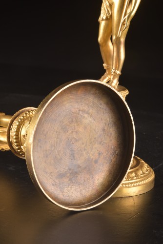 Antiquités - Paire de bougeoirs Empire en bronze doré
