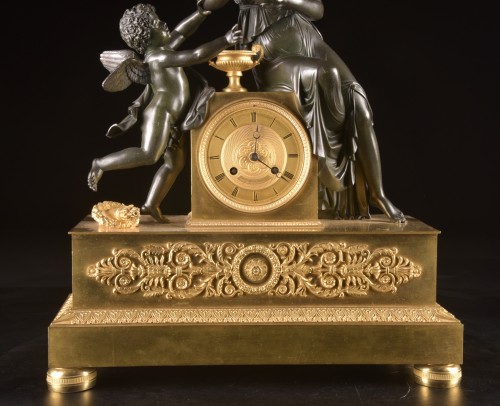 EEmpire Mantel Clock With Female Figure And Winged Putto - Horology Style Empire