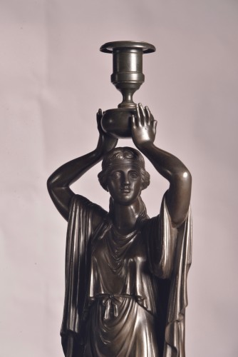 19th century - Pair Of Figurative Candlesticks In Patinated Bronze