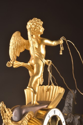 Antiquités - Pendule de char d’époque Empire en bronze doré et patiné, signée Courvoisier à Paris,