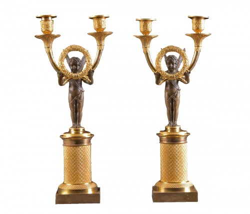 Paire de candélabres Empire en bronze doré et patiné