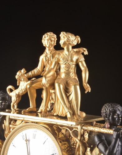 Antiquités - magnificent Empire mantel clock portraying Paul an Virginie, 