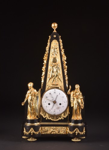 Louis XVI -  A large rare Obelisk Mantel clock with calendar. Late 18th c