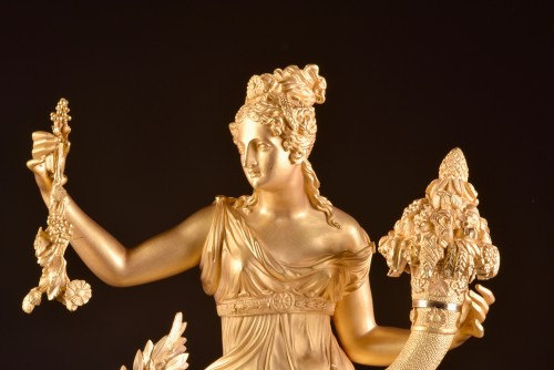 A large French gilt bronze pendule, Fortuna Goddess with the Cornucopia  - 