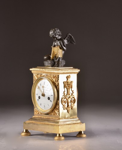 Horology  - A French Empire mantel clock with putti 