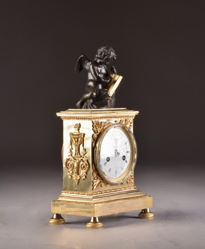 Antiquités - A French Empire mantel clock with putti 