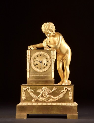 Antiquités - A French Louis Philippe mantel clock with a large putto, circa 1830