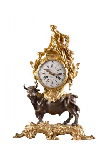 A mantel clock with a large horned bull circa 1850