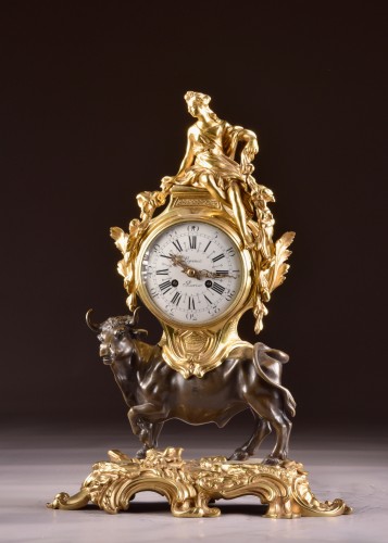 A mantel clock with a large horned bull circa 1850 - 