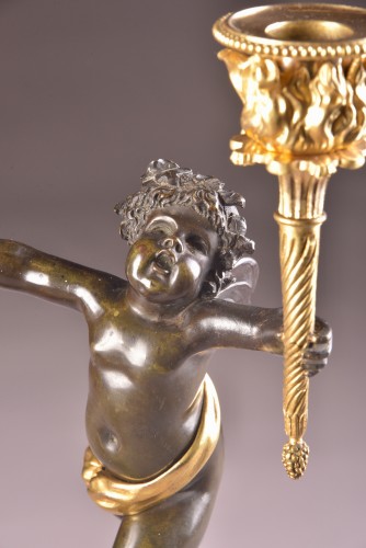 Antiquités - Pair Empire candlesticks with putti 