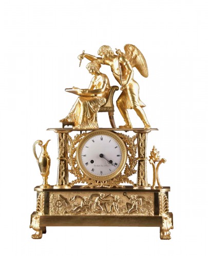 An Empire ormolu mantel clock, "INSPIRED" 