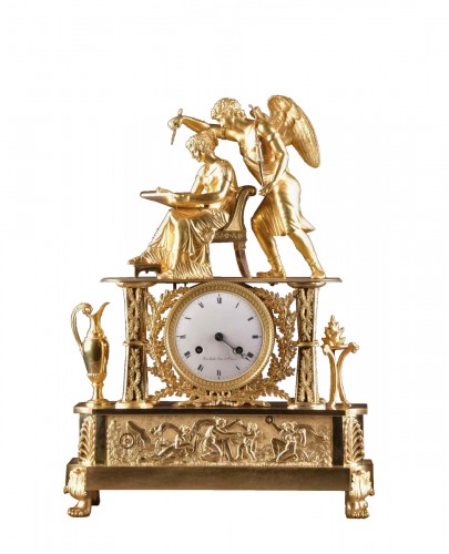 An Empire ormolu mantel clock, &quot;INSPIRED&quot; 