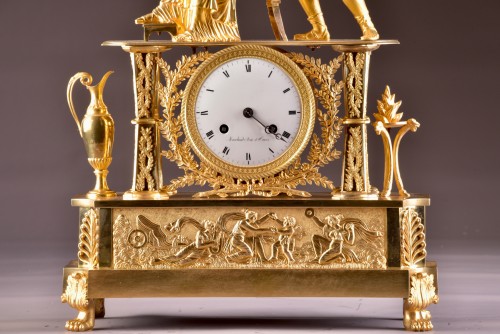 Horology  - An Empire ormolu mantel clock, &quot;INSPIRED&quot; 