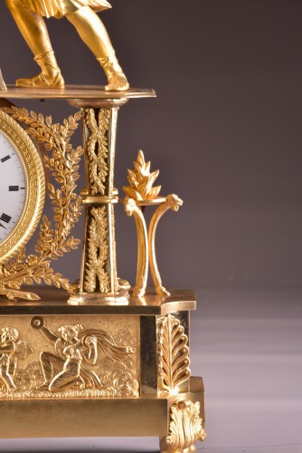 An Empire ormolu mantel clock, &quot;INSPIRED&quot;  - 