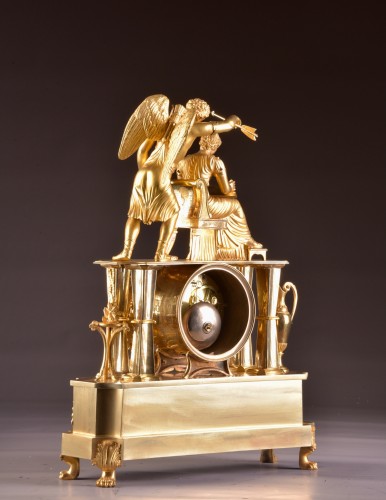 Antiquités -  L'Inspiration - Pendule Empire en bronze doré