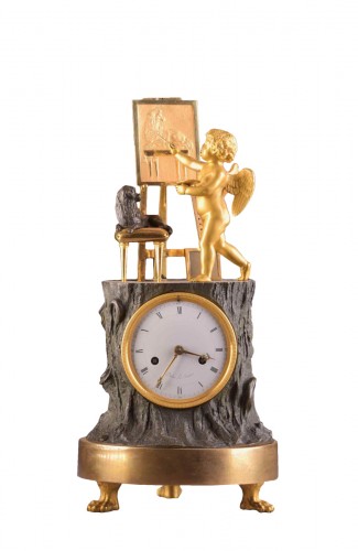 « Cupidon artiste » pendule Empire en bronze doré