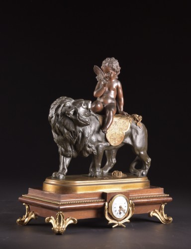 XIXe siècle - Cupidon sur lion - Grande horloge de table