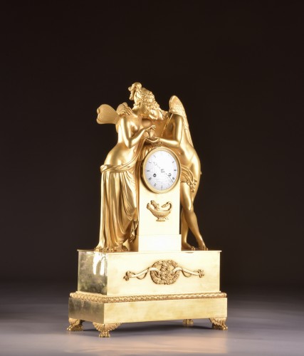 Antiquités - Psyche and Amor - A large French Empire clock
