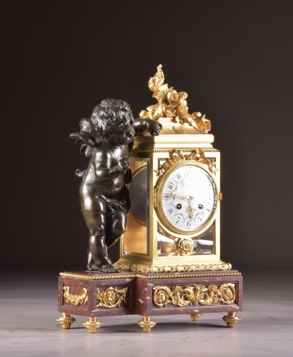 XIXe siècle - Pendule Napoléon III en bronze doré et bronze patiné à putto