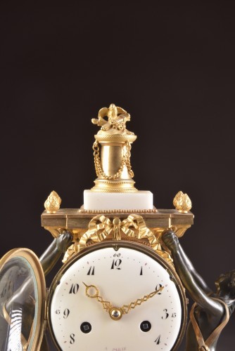 A louis xvi patinated bronze figural mantel clock - 