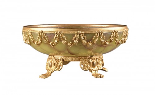 A Napoleon III Onyx jardiniere with ormolu mounted ornamenten.