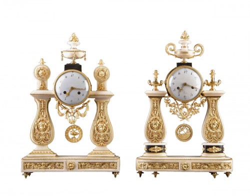 Two beautiful and large Louis XVI marble column clock
