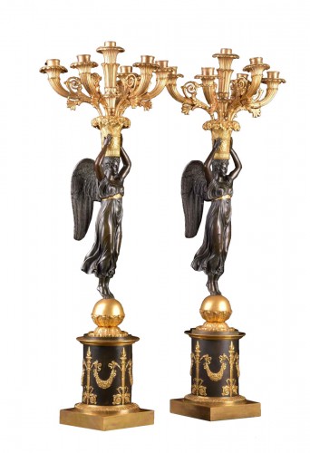Large pair of Empire  patinated and gilt bronze Figural candelabra
