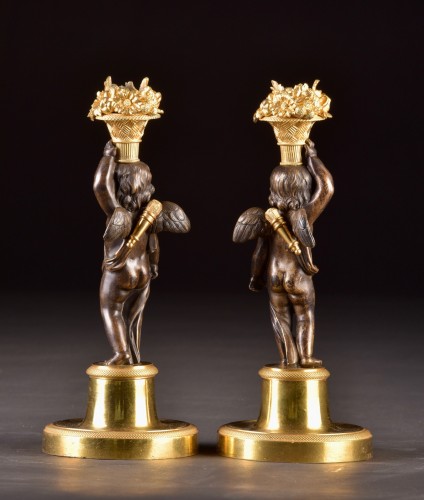 Antiquités - Elegant Louis XVI figural candlesticks with cupid figures