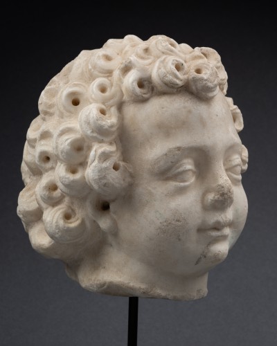 Antiquités - Deux têtes de puttis en marbre, Italie du Nord XVIe siècle