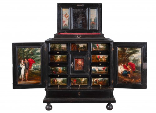A 17th century Antwerp ebony cabinet with painted panels