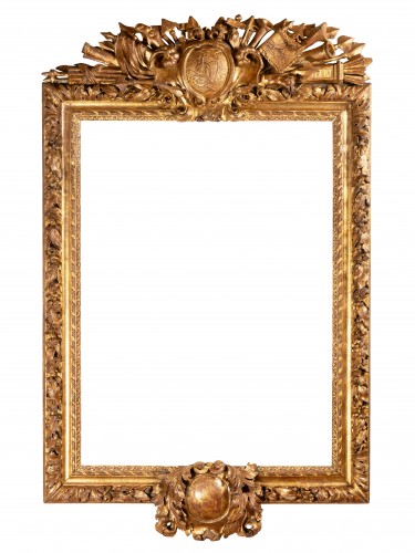 Important Louis XIII giltwood military trophy frame
