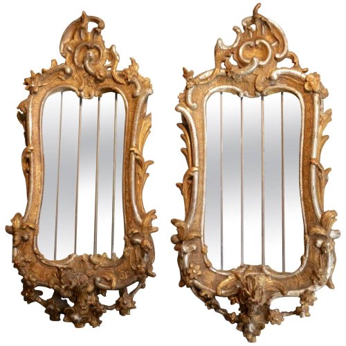 Pair of carved giltwood and silverwood mirrors, Italy, 18th century