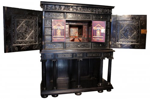 A 17th century carved ebony and ebonized wood cabinet, Paris