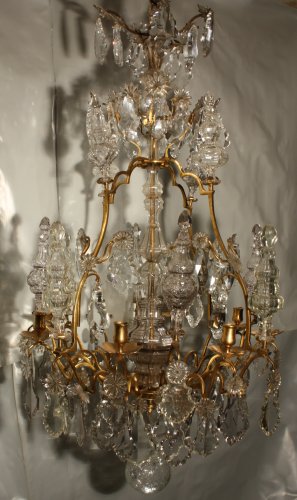 Antiquités - A Louis XV mid-18th c. gilt-bronze mounted crystal chandelier