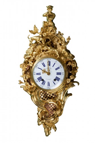 A Louis XV &quot;fox hunt&quot; cartel clock signed Dutertre