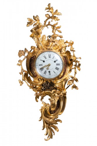 A Louis XV gilt bronze cartel clock