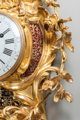 Louis XV - A Louis XV gilt bronze cartel clock