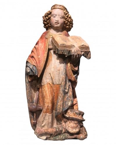 A Normand 15th c. limestone figure of St Catherine