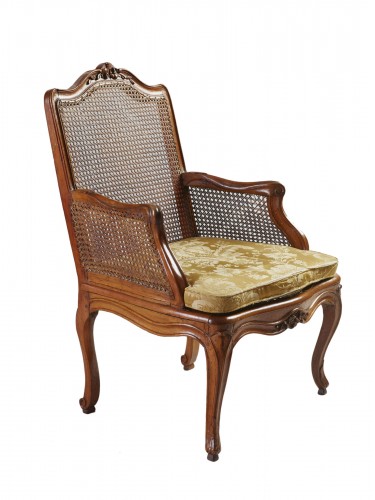 Louis XV natural wood caned bergère