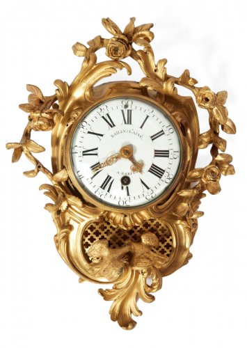 A French gilt bronze small cartel clock