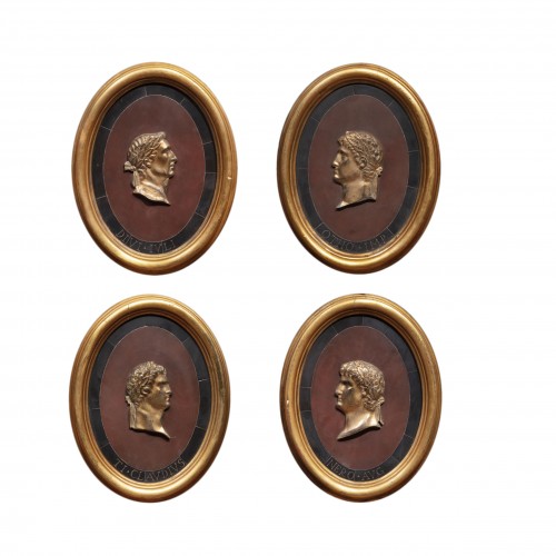 Set of four profiles of emperors in gilded bronze