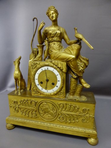 Pendule en bronze doré époque Empire - Philippe Cote Antiquités