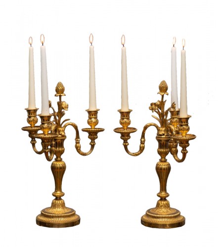 Pair of gilt bronze three-light candelabra