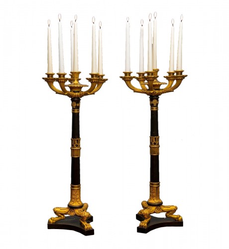 A pair of Restauration gilt and patinated bronze six-light candelabra