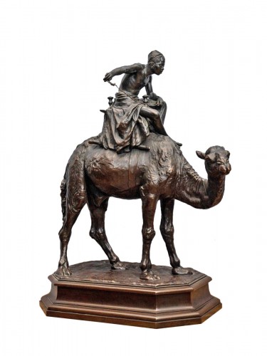 "A young Arab riding a Camel" patinated bronze statue