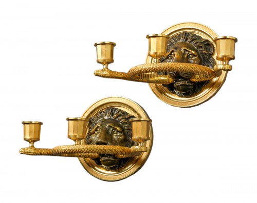 A pair of Empire three lights wall lights, attributed to PP Thomire